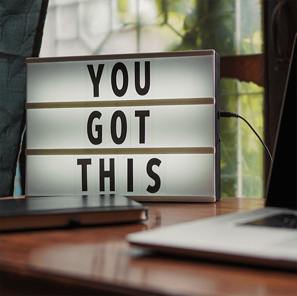 Desk sign with text: You Got This